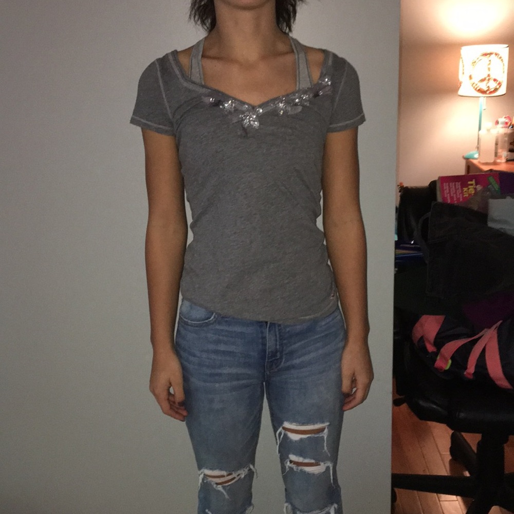 Grey shirt with detail around collar